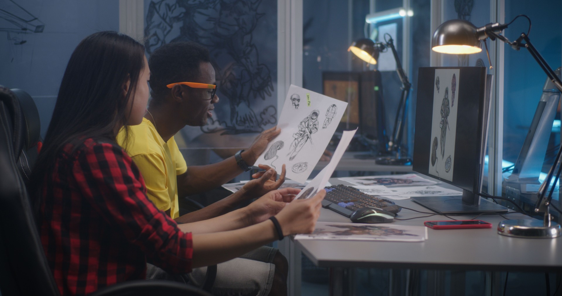 Designers discussing video game character creation